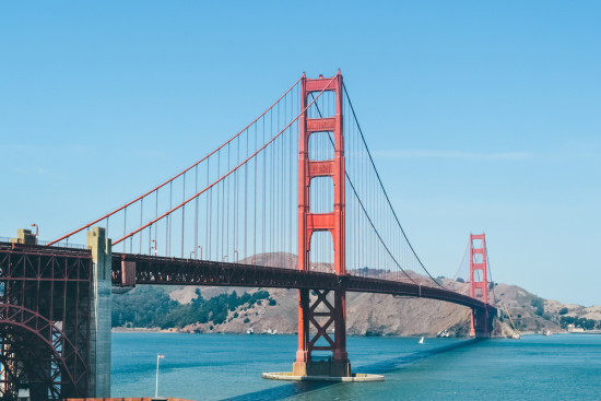 THE USS CONSTELLATION PASSES UNDER THE GOLDEN GATE BRIDGE DURING FLEET WEEK IN 2000 - THE SITREP MILITARY BLOG